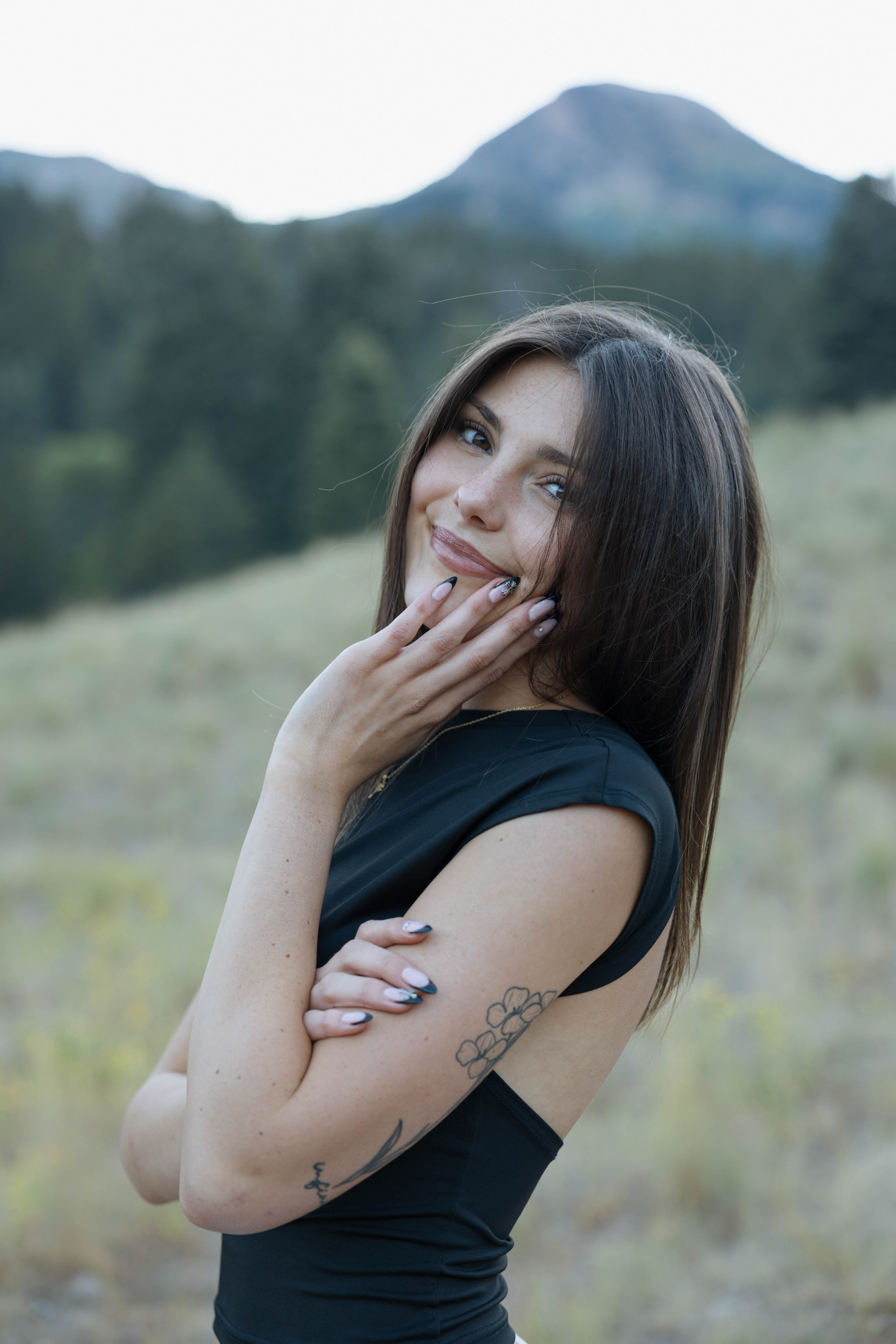 Ella Elevateendo's Dental assistant smiling mountain background 